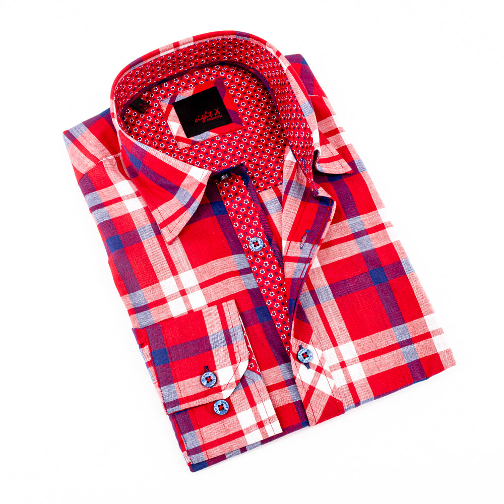 Folded long-sleeve, red linen button-up with plaid pattern and red calico trim. Includes blue buttons and spread collar. 
