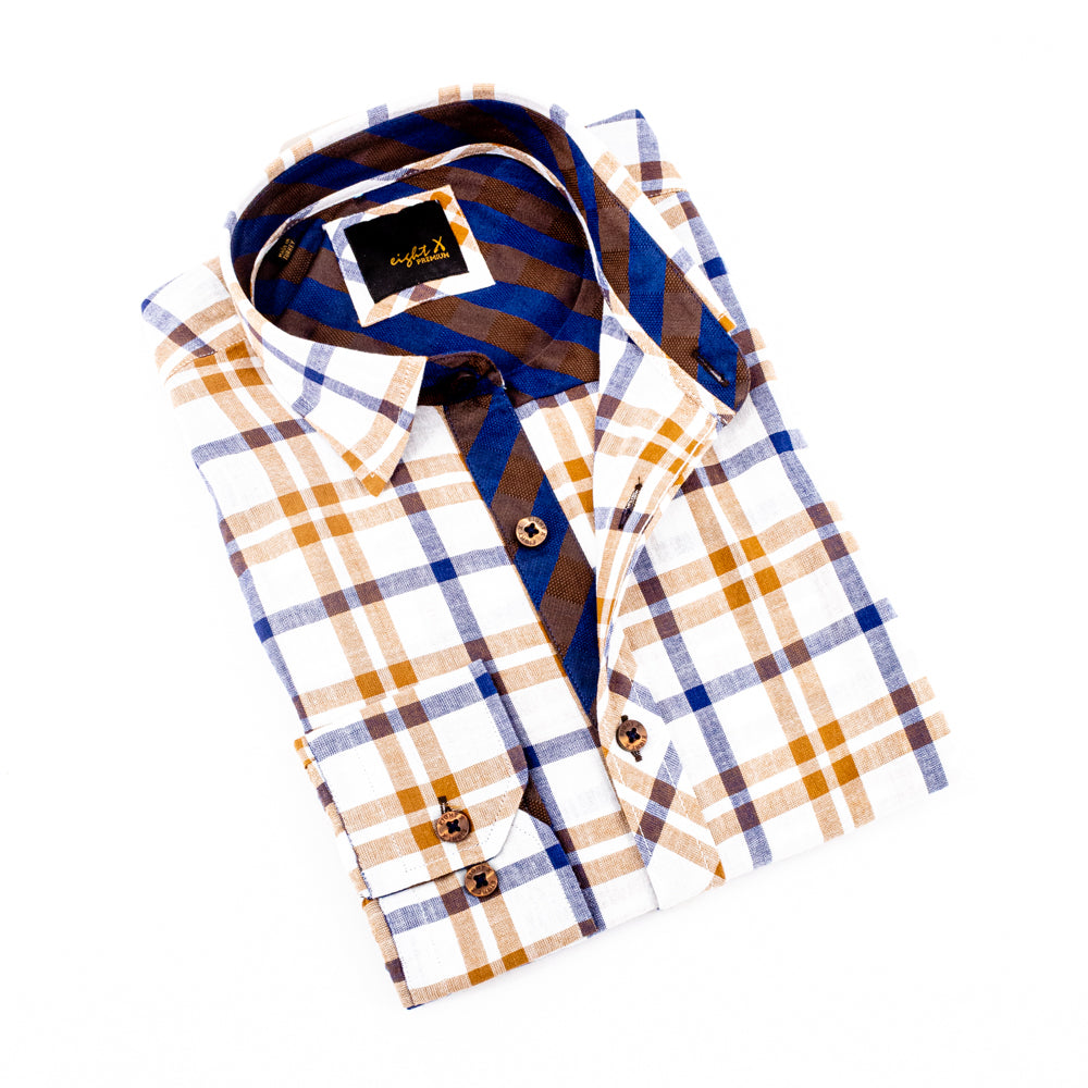 Folded long-sleeve, white linen button-up with camel plaid pattern and navy checkered trim. Includes brown buttons and spread collar. 