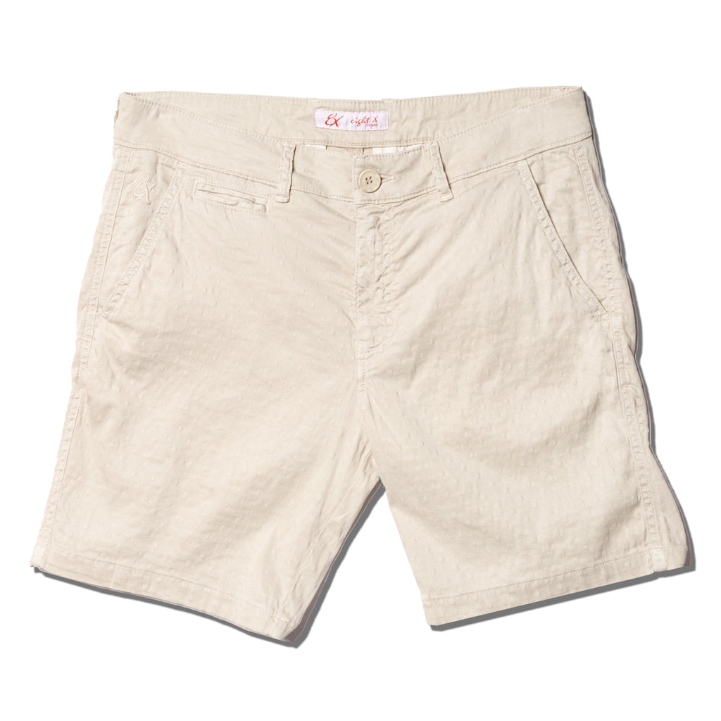 Beige textured jacquard shorts with front welt pocket