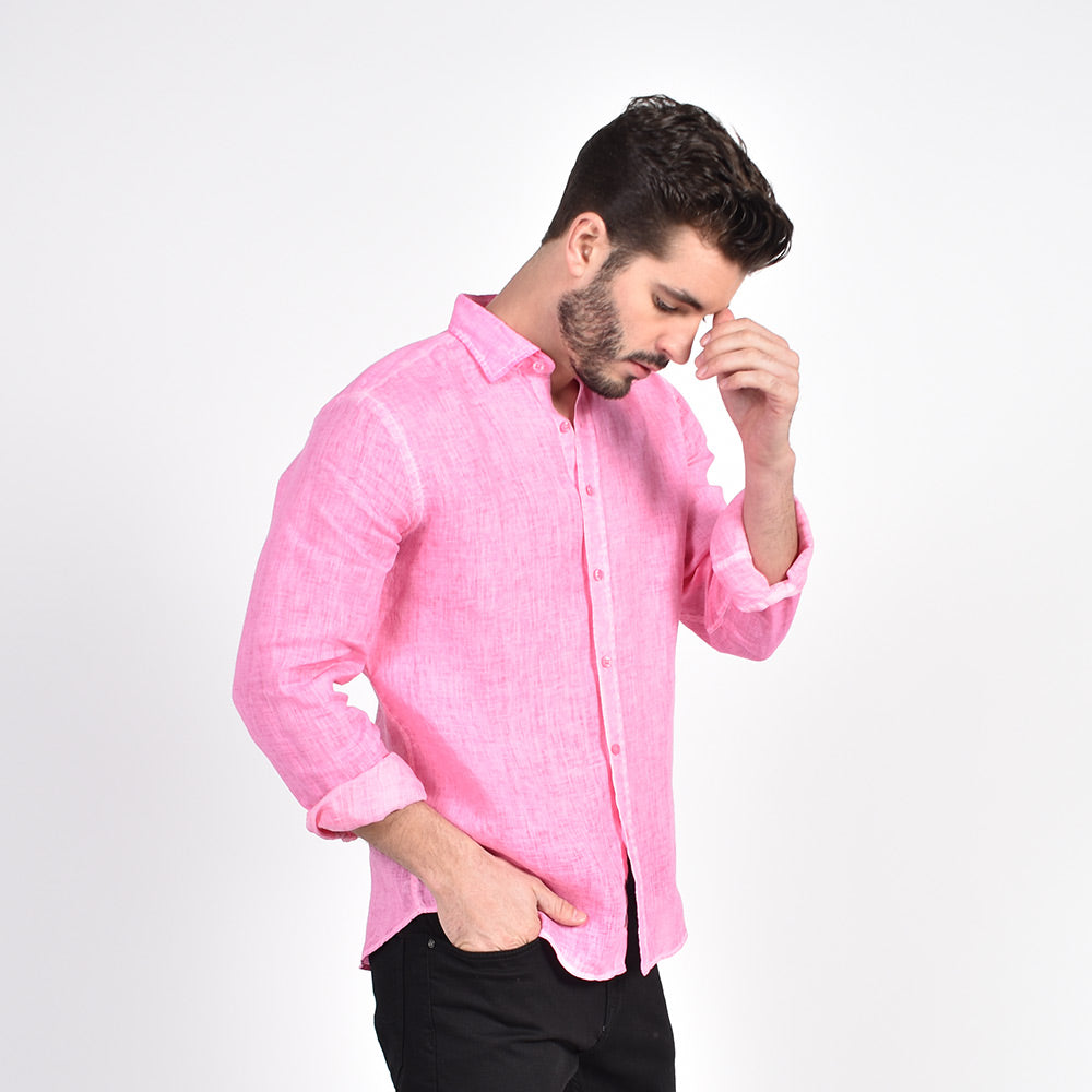 Model in long-sleeve, solid pink linen button-up. 