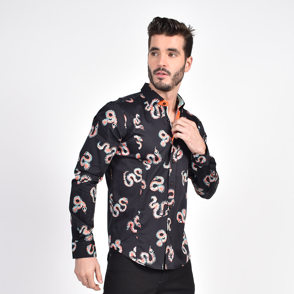 Model in black button-up with blue and orange abstract snake print.