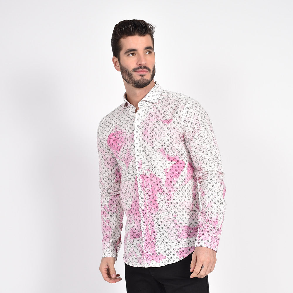 Model in long-sleeve, white linen button up with light-pink tie-dye finish and calico print. 