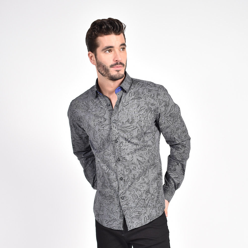 Model in black button up with garden print.