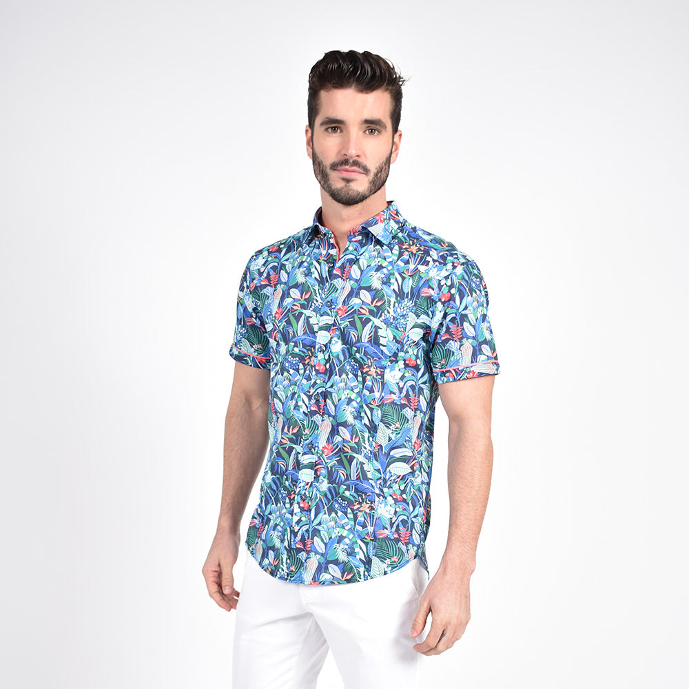 Model in short-sleeve button-up with rainforest digital-print.