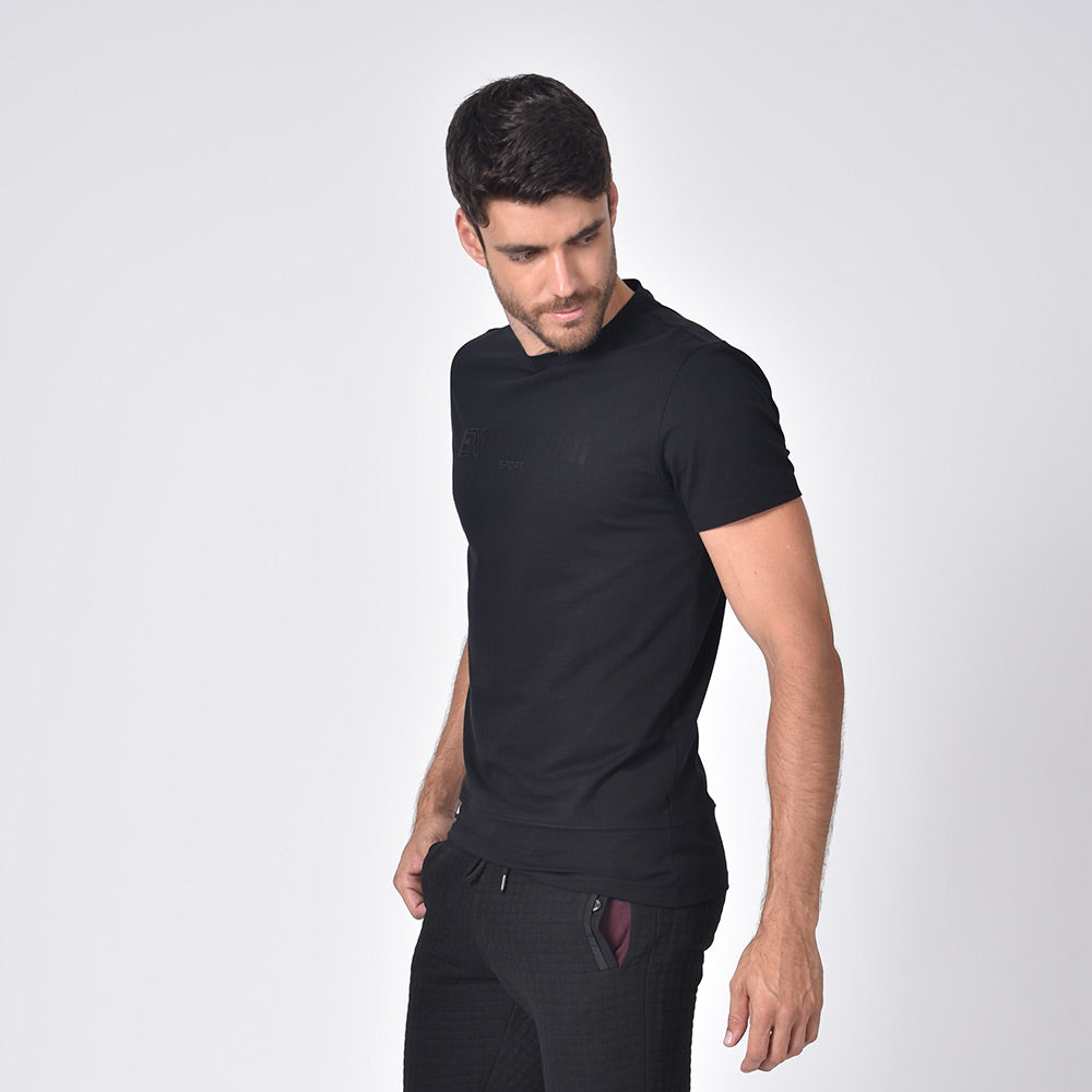 Model in black, short-sleeve cotton crew-neck with silicone “EX Premium Sport” logo on front. 