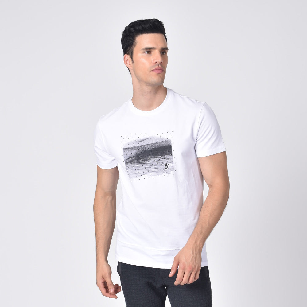 Model in white, short-sleeve cotton crew-neck with silicone print design on front.