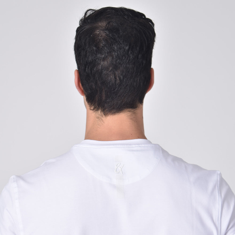 Detail of silicone "8x" logo on back.
