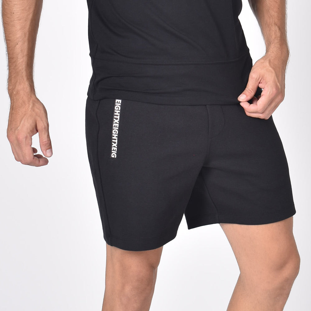 Mid-length cotton gym shorts with “Eight-X” logo on right leg.