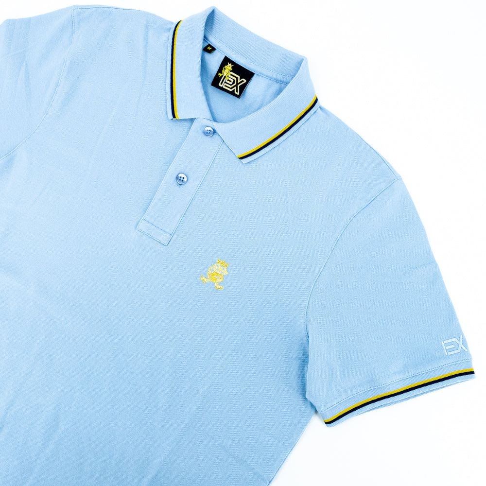 Light-blue polo with tipped collar, two-button placket, and striped, ribbed armbands. Featuring embroidered gold frog mascot and embroidered EX Logo on left sleeve.