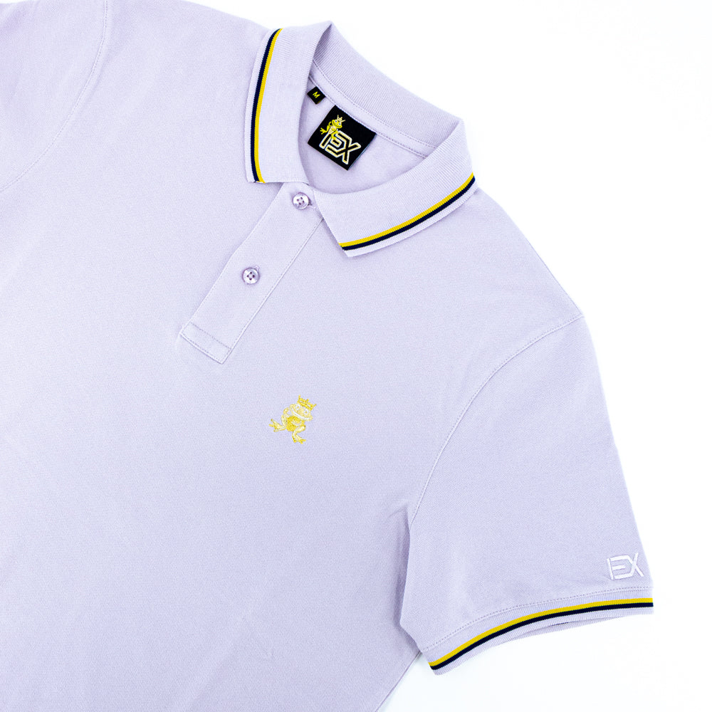 Lilac polo with tipped collar, two-button placket, and striped, ribbed armbands. Featuring embroidered gold frog mascot and embroidered EX Logo on left sleeve.