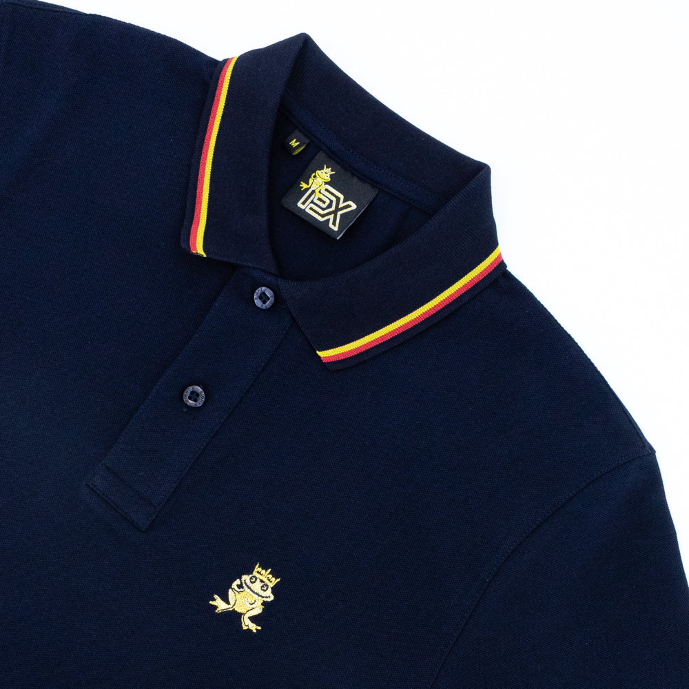 Navy-blue polo with tipped collar, two-button placket, and striped, ribbed armbands. Featuring embroidered gold frog mascot.