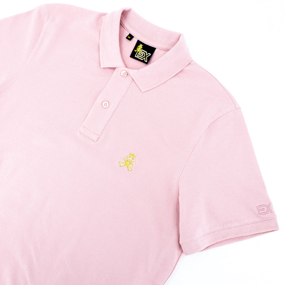Light-pink polo with two-button placket, ribbed armbands, embroidered gold frog mascot, and embroidered EX logo on left sleeve.  