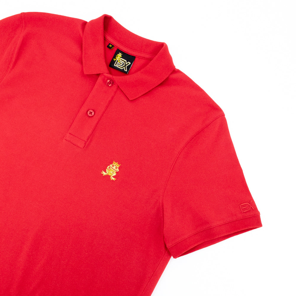 Red  polo with two-button placket, ribbed armbands, embroidered gold frog mascot, and embroidered EX logo on left sleeve.  