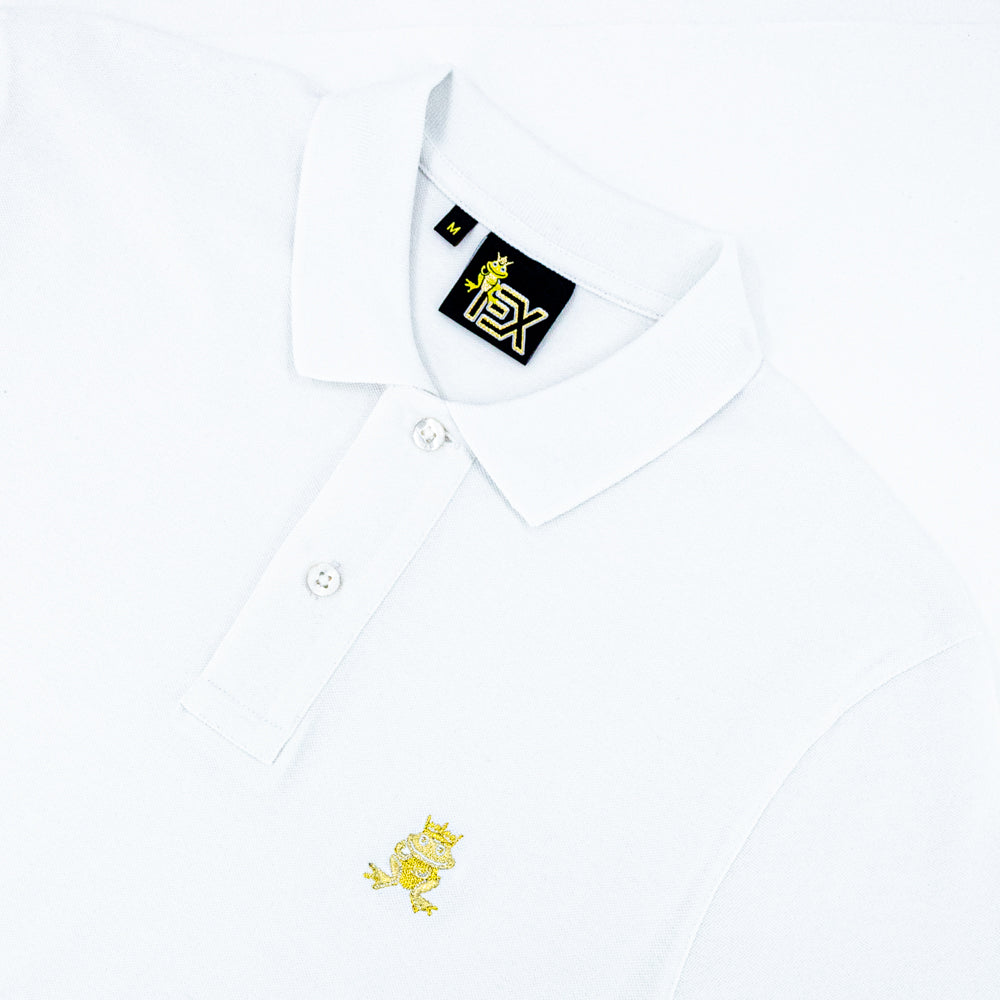 White  polo with two-button placket, ribbed armbands, and embroidered gold frog mascot. 