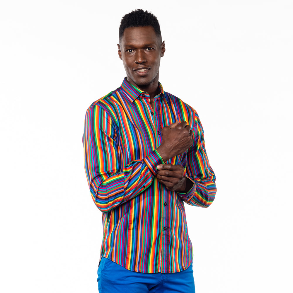 Model in multi-colored button up with roman stripes.
