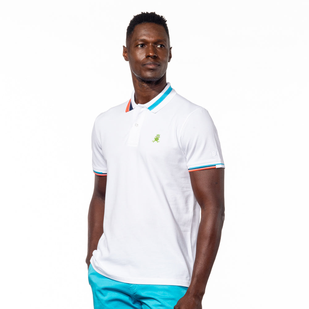 Model wearing white polo with block-striped collar.