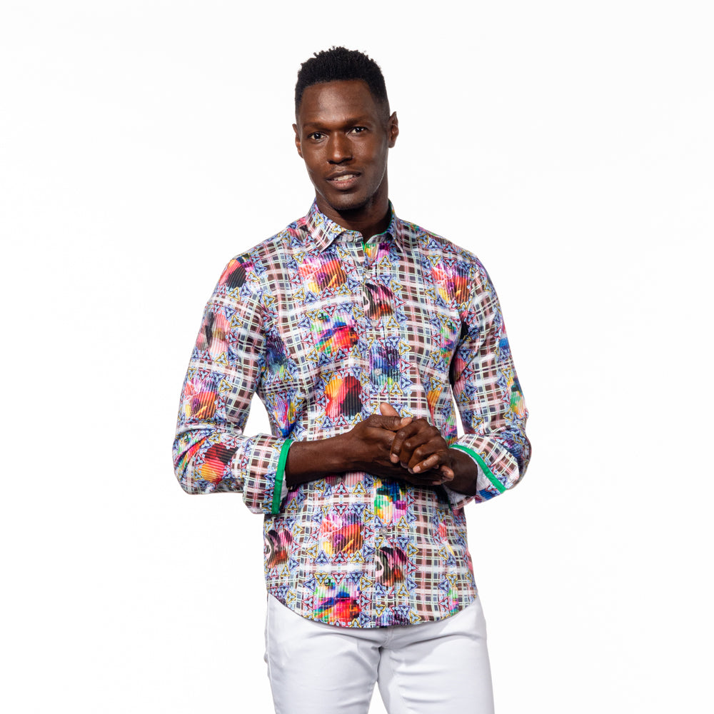 Model in button-up with plaid digital print and floral overlay.