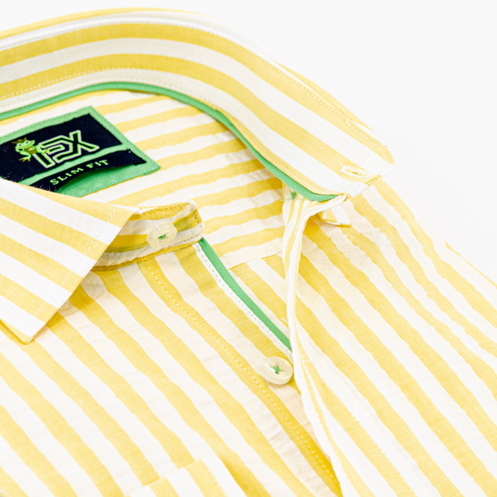 Detail of light-yellow seersucker’s collar and green trim.