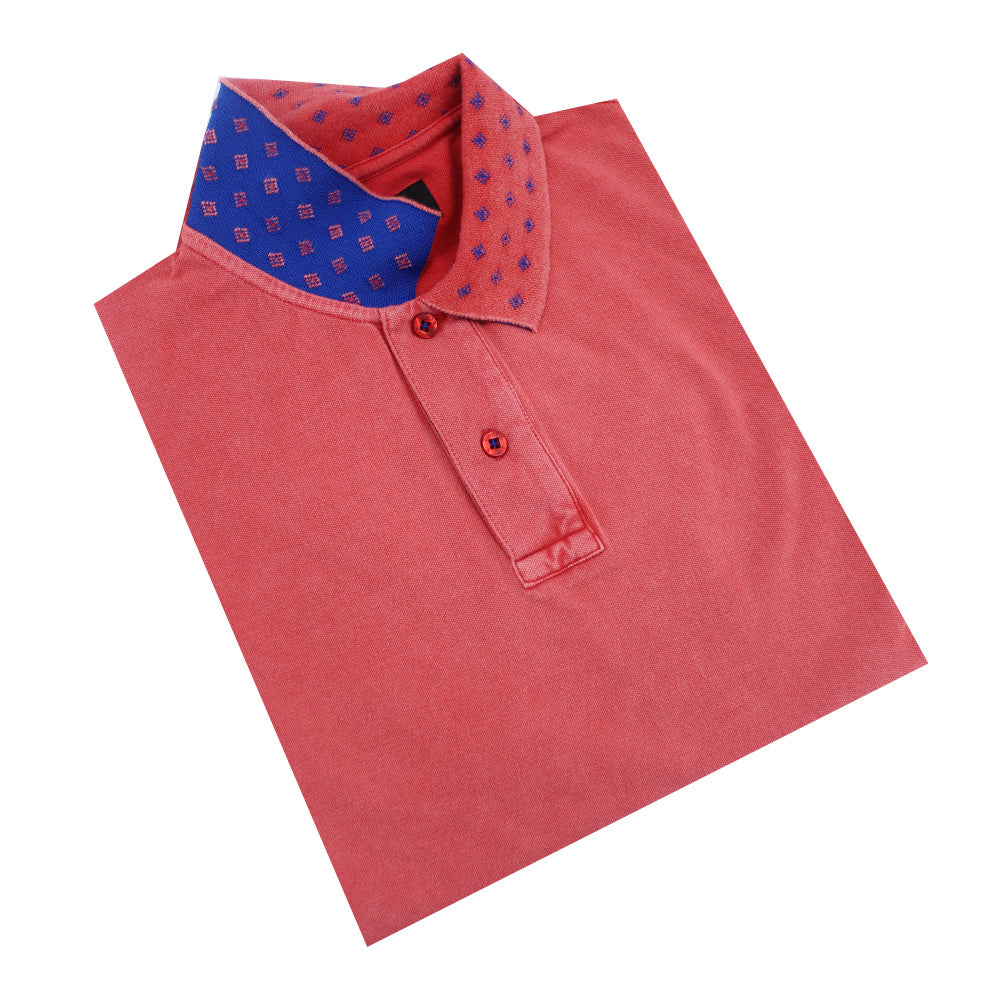 Royal-blue reversible collar with coral diamond grid.