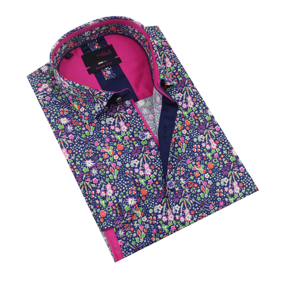 Folded navy-blue button-up in multi-colored floral print in fuchsia, orange and green. Features fuchsia and navy trim. 