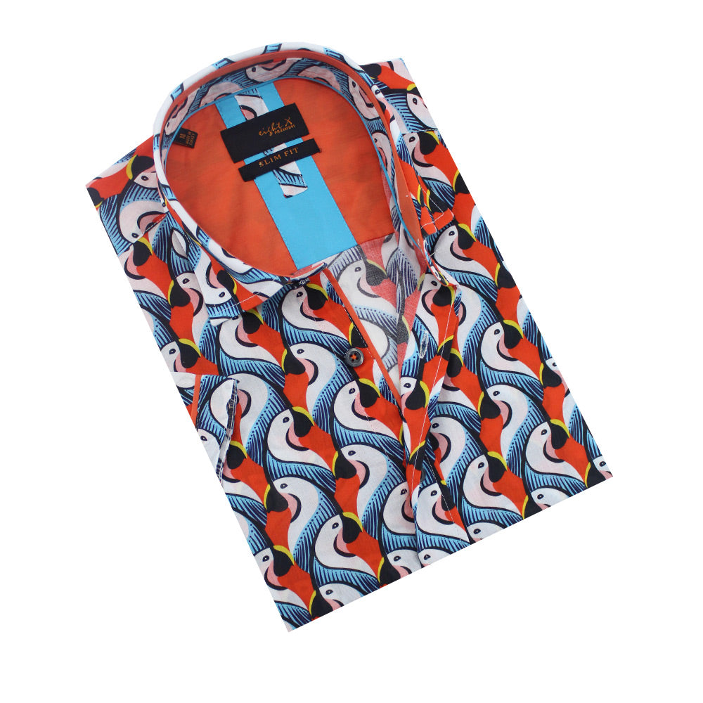 Folded short-sleeve orange button-up with parrot pattern.