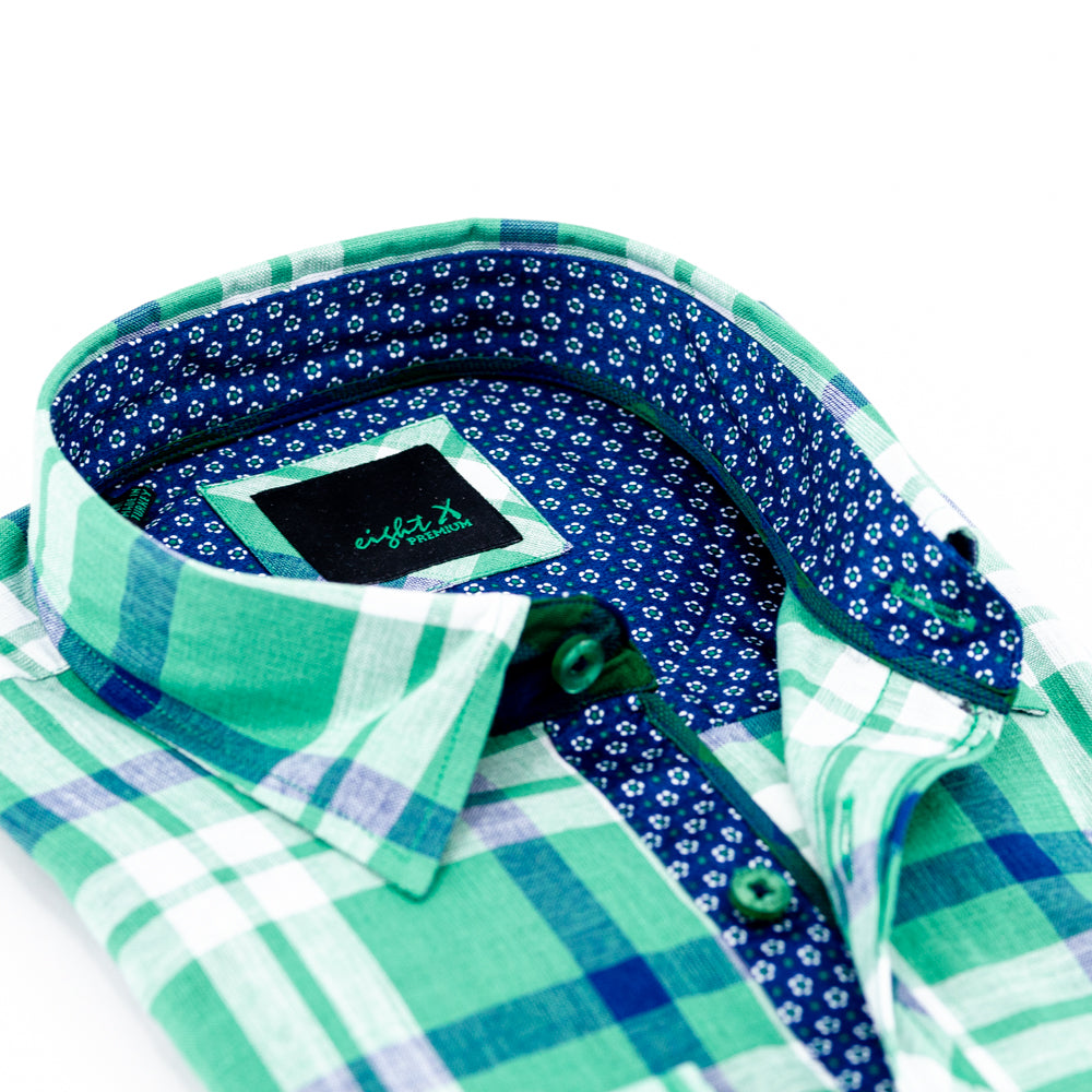 Detail of green plaid linen collar and royal-blue calico trim.