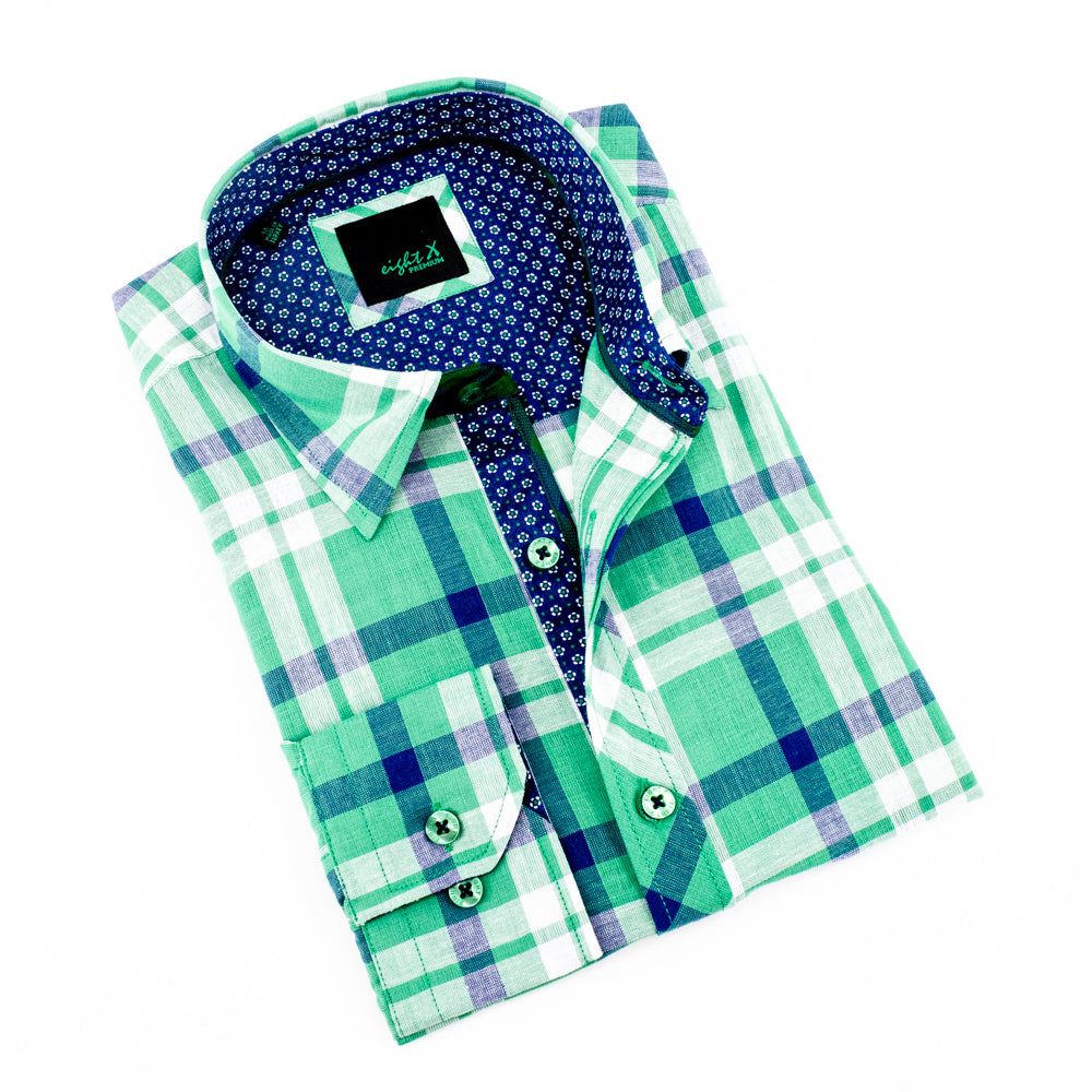Folded long-sleeve, green linen button-up with plaid patterns and royal-blue calico trim. Includes green buttons and spread collar. 