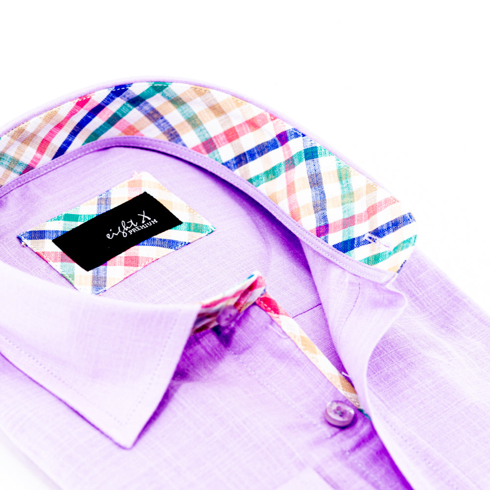 Detail of lilac cotton linen collar and pastel-colored trim.