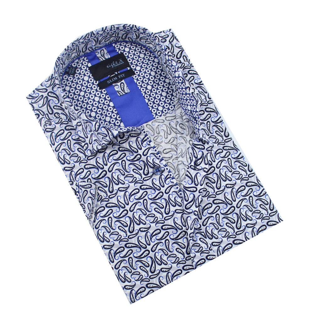 Folded short-sleeve white button-up in blue and navy paisley print.