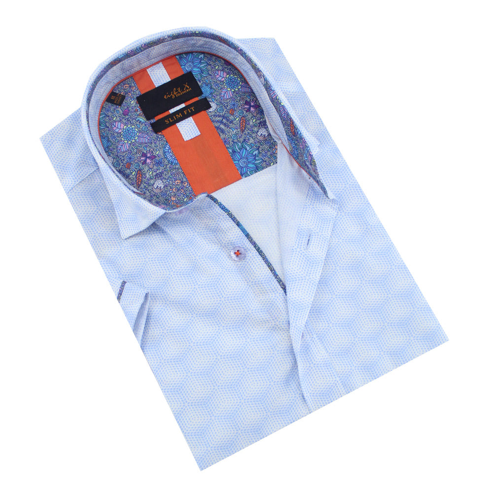 Folded powder-blue button-up with floral trim.