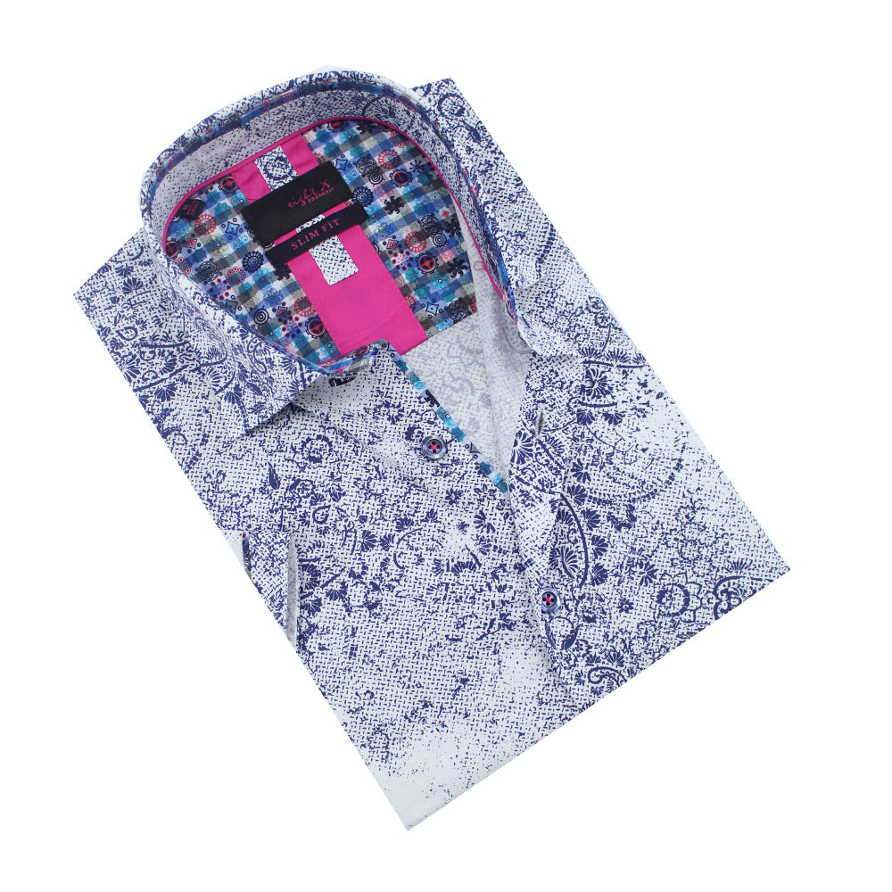 Folded short-sleeve white button-up in faded, navy paisley print. 