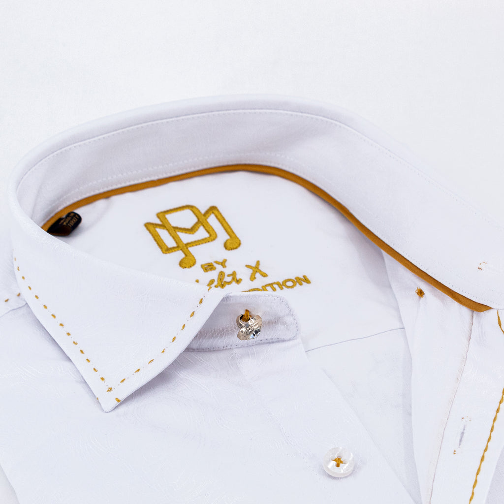 close up of white shirt with gold lined collar and stitching