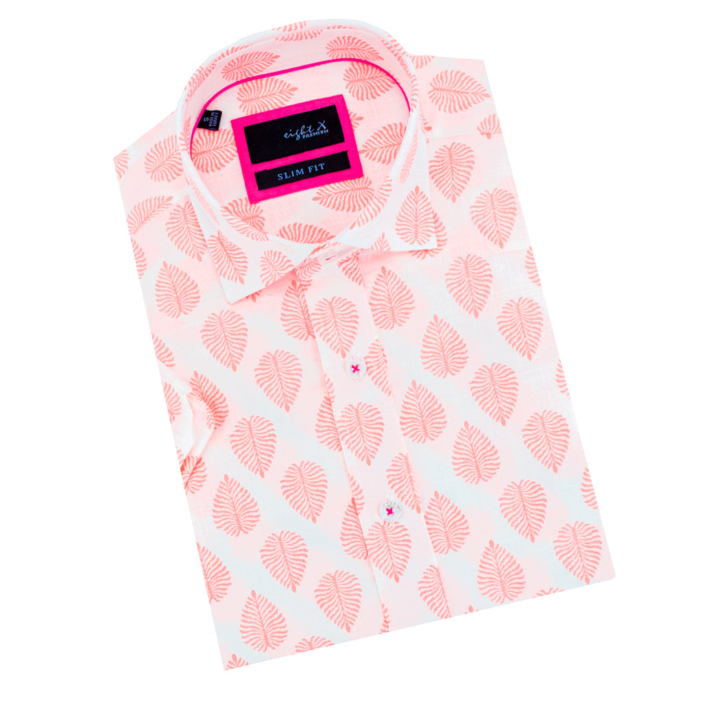 white linen shirt with bright pink leaf motif