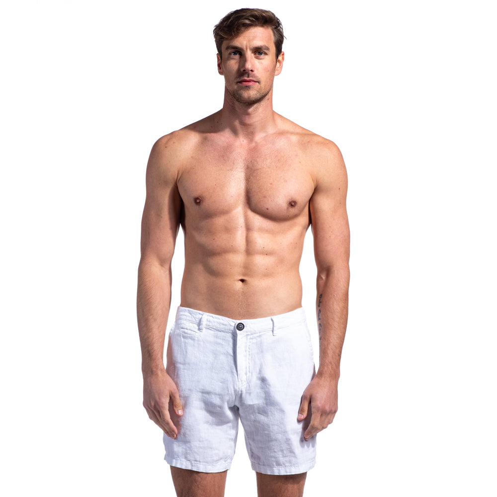 Model Wearing White, Slim Fit Shorts, Front Facing Zipper Fly.