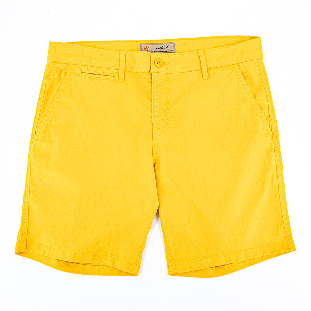 Yellow jacquard shorts with two front slant-pockets; one front welt-pocket; and embroidered logo on front right pocket.
