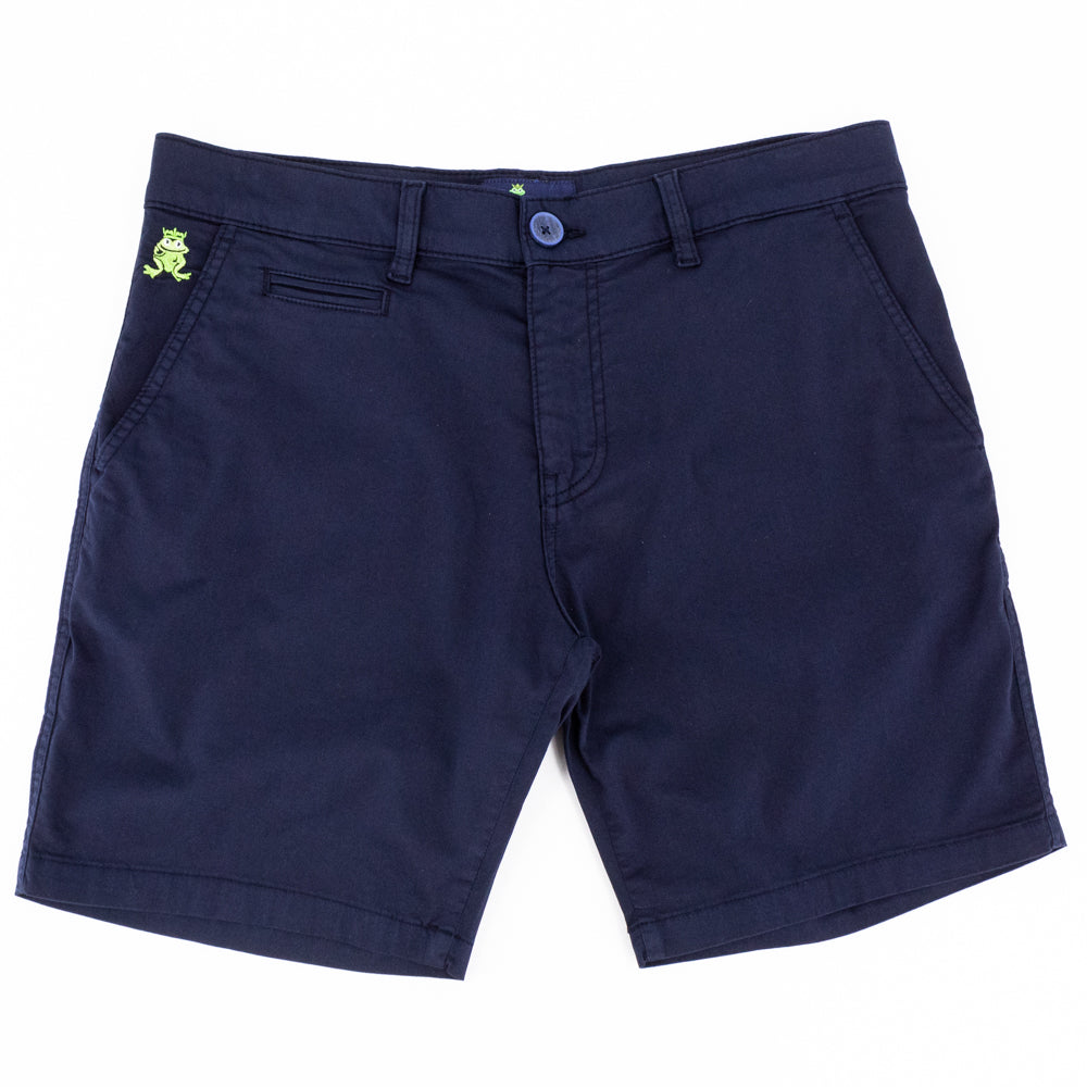 Flat-lay of navy blue shorts with two front pockets; one welt pocket; and green embroidered frog mascot on right front-pocket.
