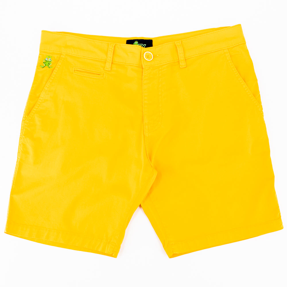 Flat-lay of bright-yellow shorts with two front pockets; one welt pocket; and green embroidered frog mascot on right front-pocket.