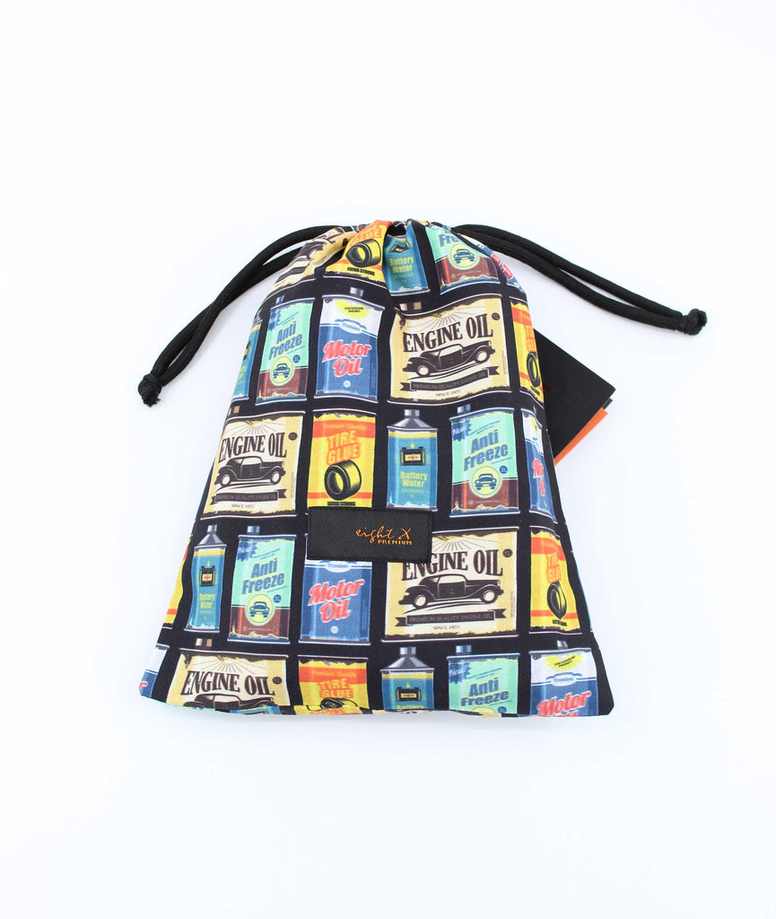 Men's black swim trunks with colorful mechanic prints