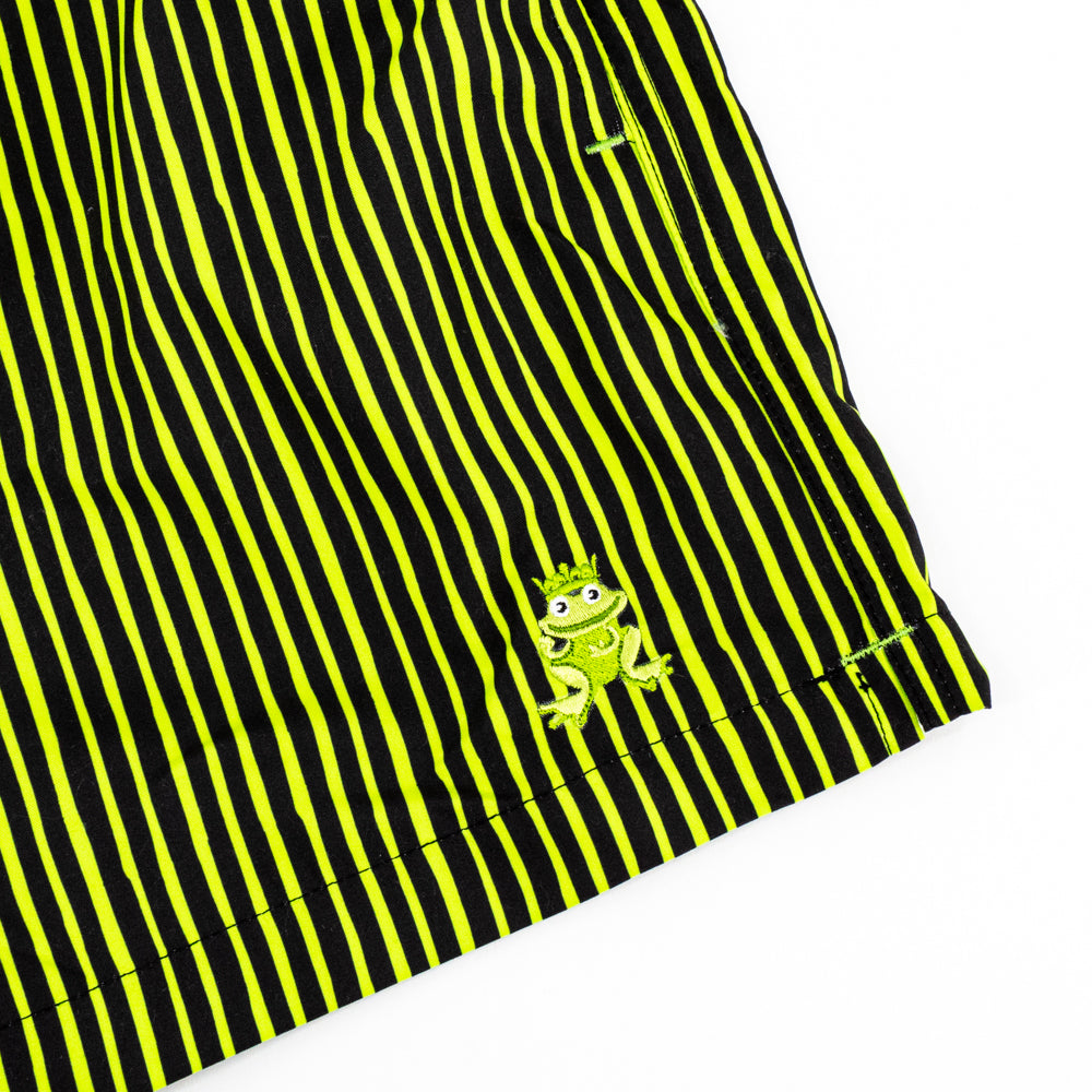 Up Close View. Ex Frog Logo on Green and Black Striped Swim Trunks. Mid Thigh Cut.