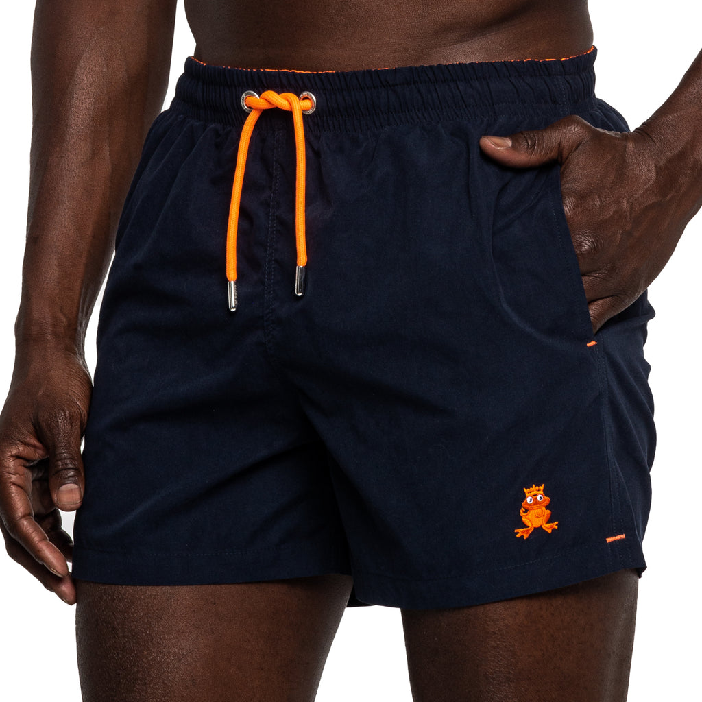 Navy polyester swim shorts with orange draw strings and frog logo
