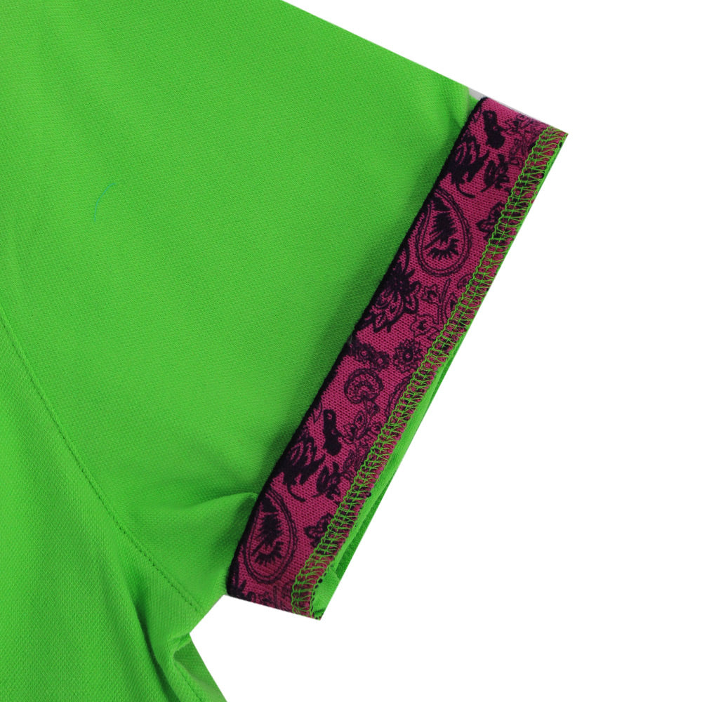 Detail of hot-pink paisley print on ribbed armband reverse.
