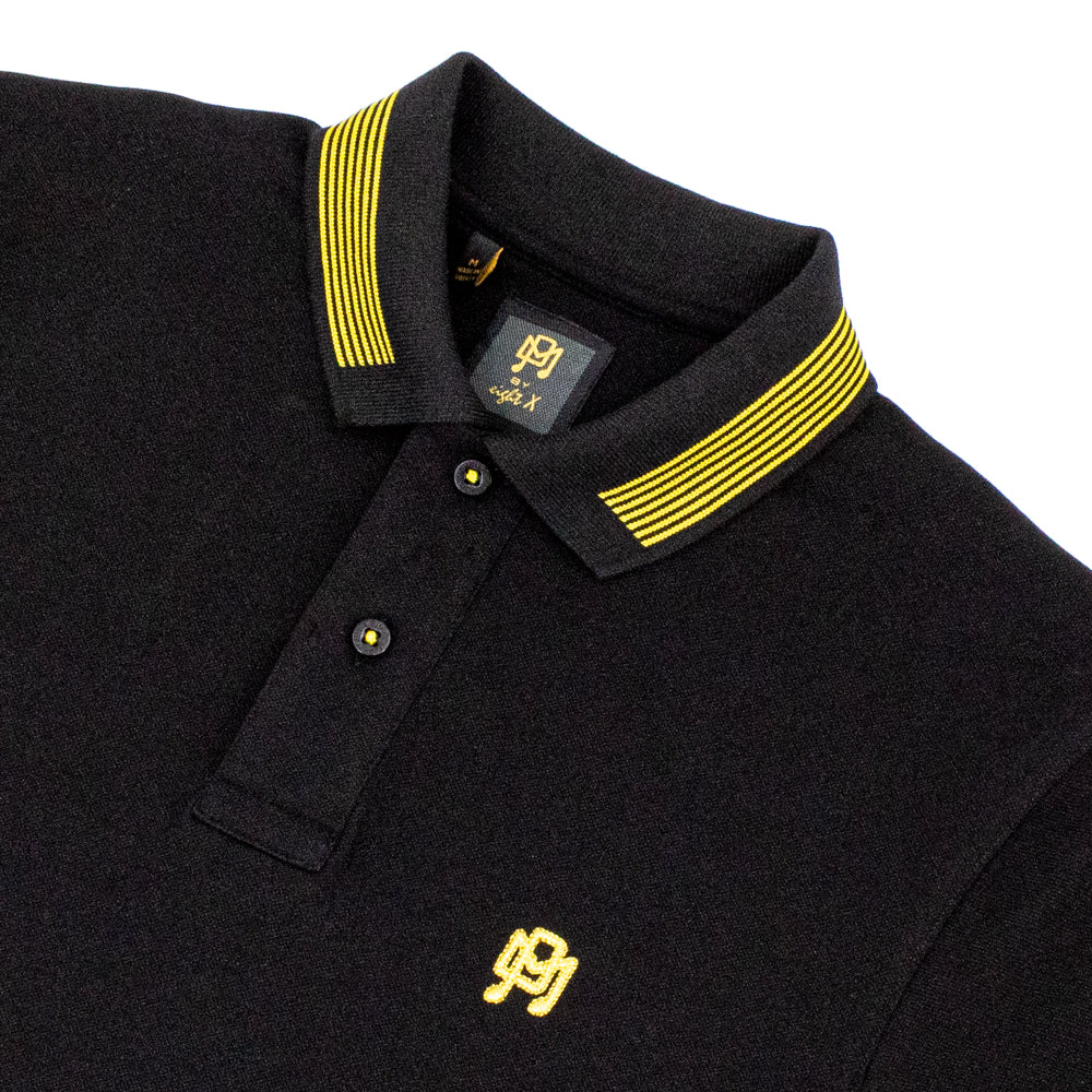 Black Polo, Yellow Accents on the Collar, Button Thread, and Chest Logo.